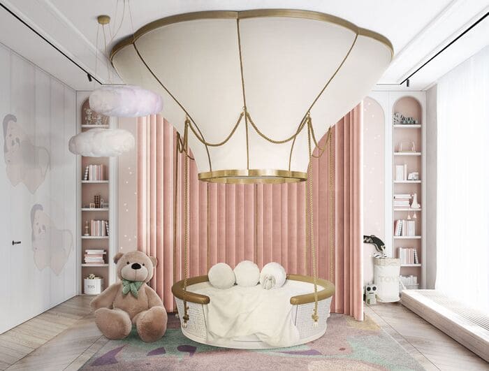 Adorable pink-toned bedroom with a unique bed resembling a hot air balloon.