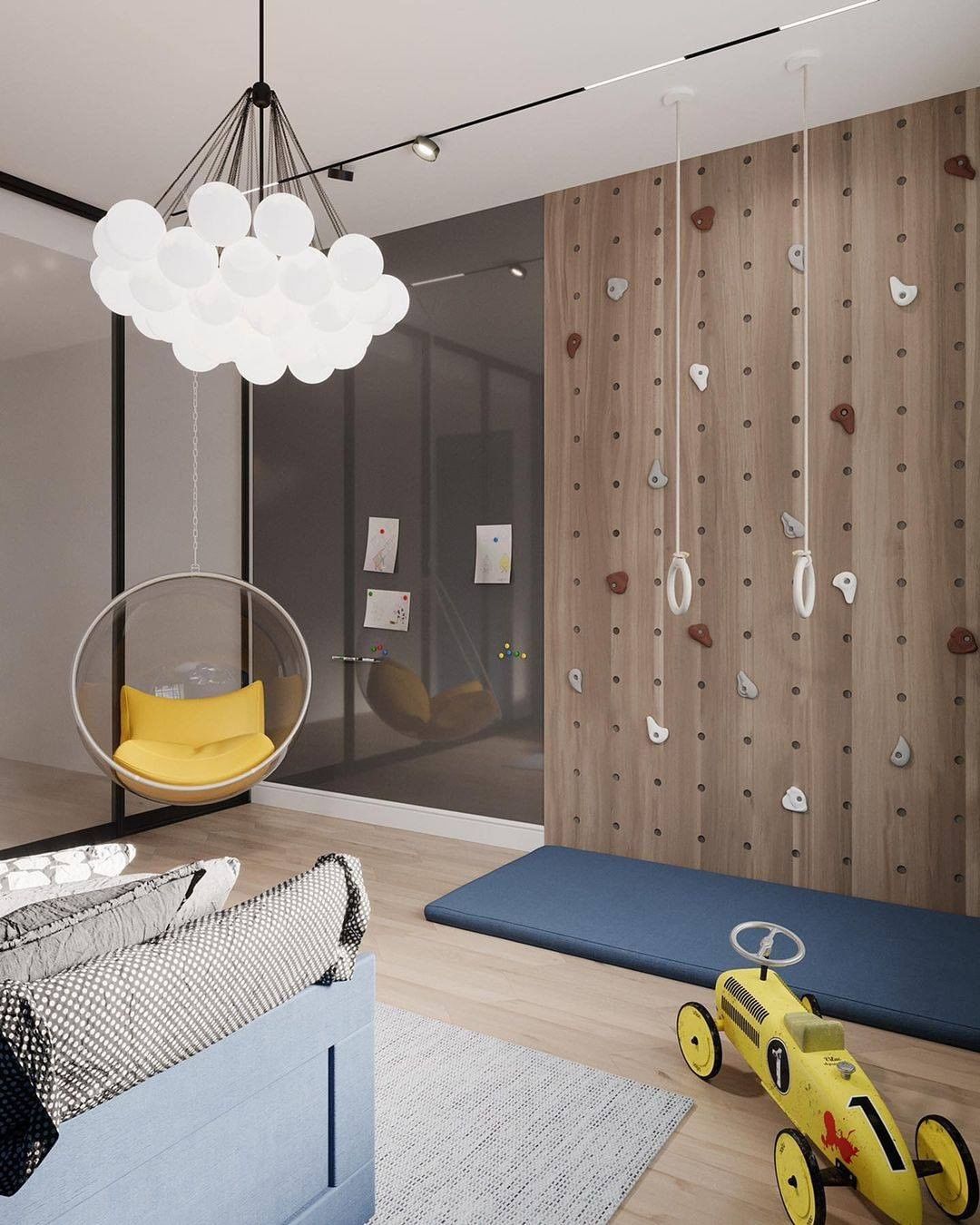 Modern boys room design with a playa rea designed by Yudina Design